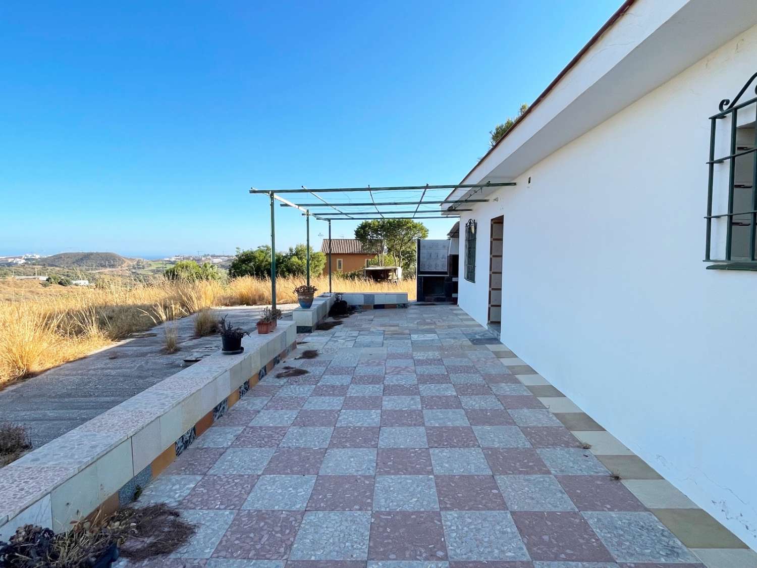 Finca rústica con Casa registrada en La Cala de Mijas, 14.000m2, agua y luz, pozo legalizado, aljibe.